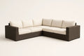 Corner sofa in brown woven resin with cream cushions - brown/cream