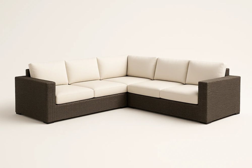 Corner sofa in brown woven resin with cream cushions - brown/cream